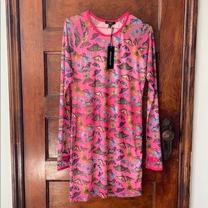 Pink butterfly printed dress with mesh sleeves.